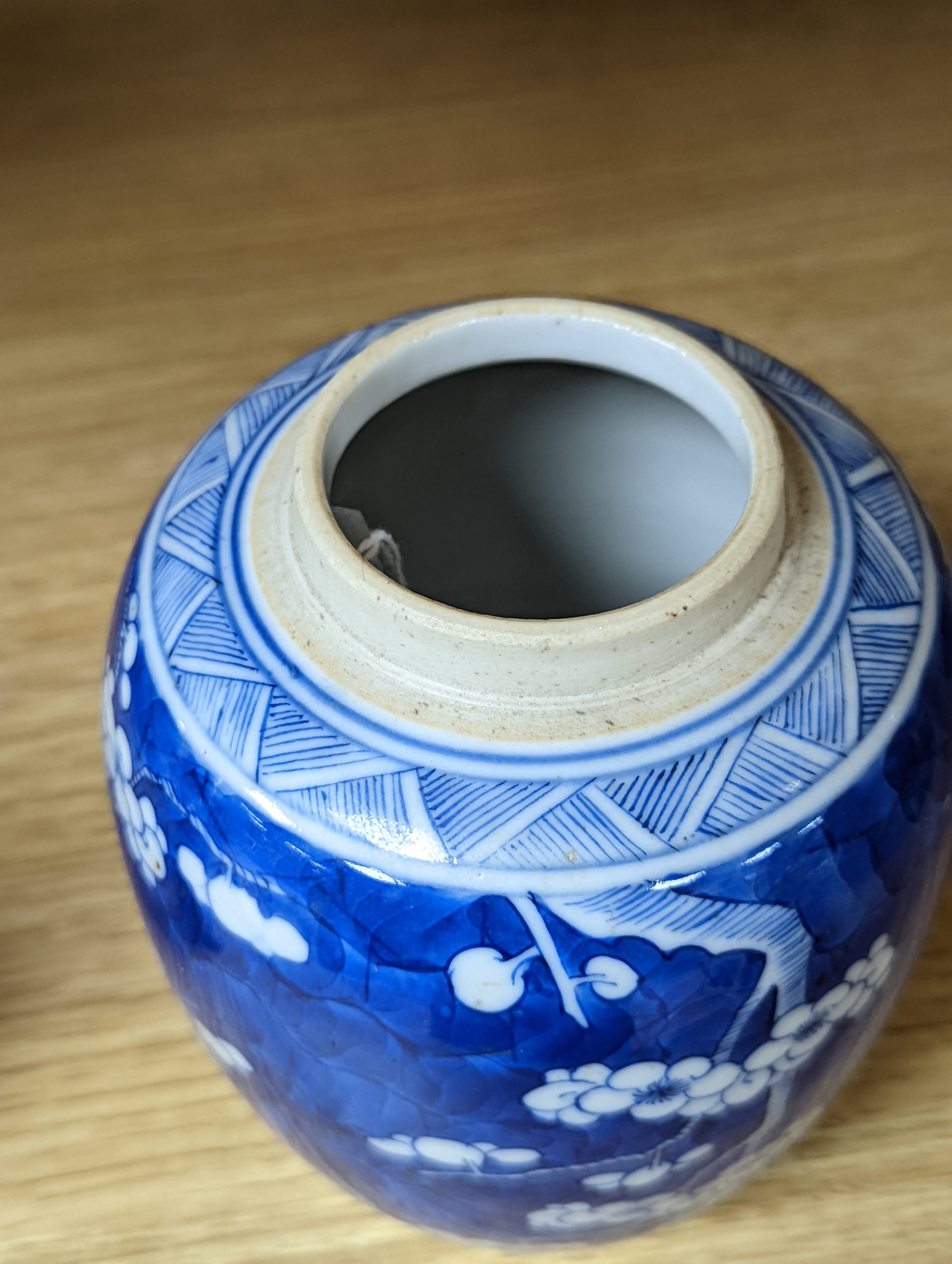 A 19th century Chinese blue and white prunus jar 13.5cm